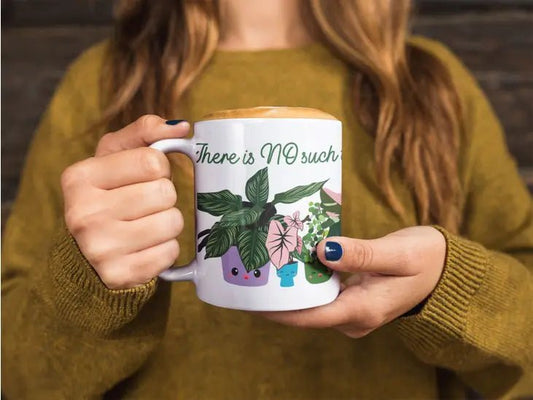 A mug featuring a plant motif, serving as a gentle reminder that plants never enough plants you can own,